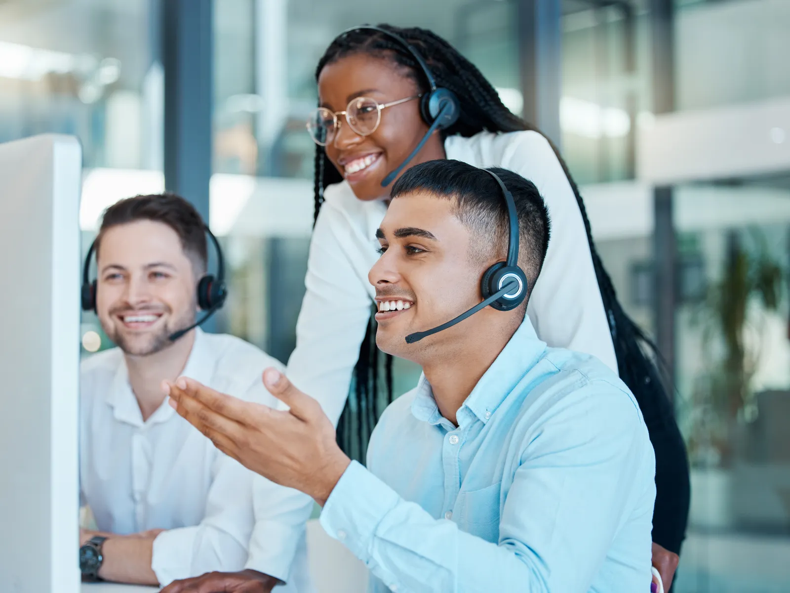 a few men wearing headsets